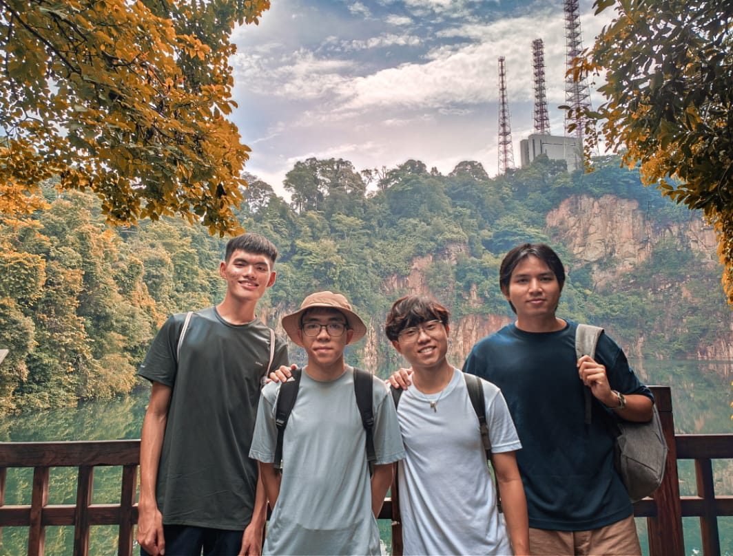 Friends beside a forest overlook